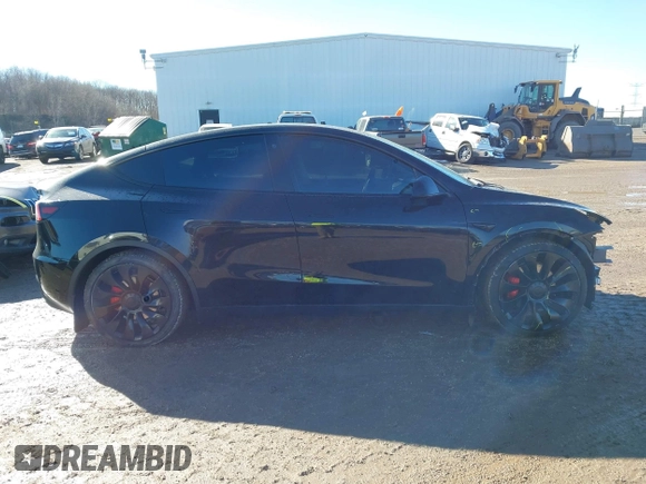 2022 Tesla Model Y Performance with VIN 7SAYGDEFXNF313636, listed as a IAAI auction lot 41660019 with 30,258 mi miles and . Bid and sale history available at DreamBid. Image 14.
