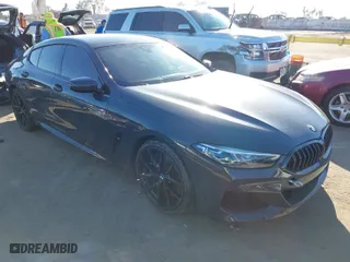 2022 BMW 8 Series M850i with VIN WBAGV8C04NCJ71251, listed as a IAAI auction lot 41657273 with 40,038 mi miles. Bid and sale history available at carsss.com. Image 1.