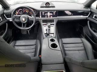 2021 Porsche Panamera с VIN WP0AJ2A75ML120017, выставлен на аукционе Copart как лот 81517913 с пробегом 26 083 миль миль и . История ставок и продаж доступна на DreamBid. Изображение 8.