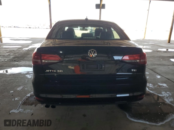 2016 Volkswagen Jetta SEL z VIN 3VWL07AJXGM347854, wystawiony jako Copart lot #53803895 z przebiegiem 107 384 mil mil oraz Szkoda całkowita • Salvage title. Historia ofert i sprzedaży dostępna na DreamBid. Obrazek 6.