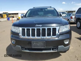 2013 Jeep Grand Cherokee Overland with VIN 1C4RJFCG5DC638927, listed as a Copart auction lot 52752615 with 117,494 mi miles and Salvage Title. Bid and sale history available at carsss.com. Image 5.