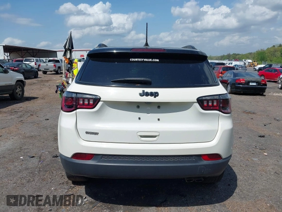 2021 Jeep Compass Altitude with VIN 3C4NJCBB8MT531586, listed as a IAAI auction lot 41941336 with 61,476 mi miles. Bid and sale history available at carsss.com. Image 16.