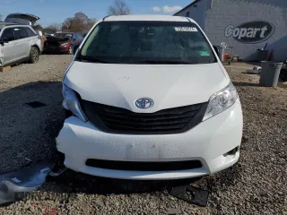 2014 Toyota Sienna L с VIN 5TDZK3DC5ES451825, выставлен на аукционе Copart как лот 79619074 с пробегом 151 146 миль миль и Списание • Salvage title. История ставок и продаж доступна на DreamBid. Изображение 5.
