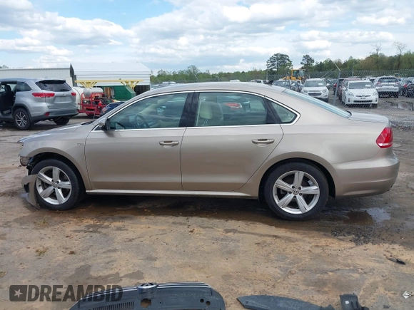 2015 Volkswagen Passat 1.8T Limited Edition with VIN 1VWAT7A32FC120769, listed as a IAAI auction lot 42013547 with 61,451 mi miles. Bid and sale history available at carsss.com. Image 14.
