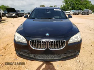 2015 BMW 7 Series 740Li xDrive with VIN WBAYF4C53FGS99237, listed as a Copart auction lot 55128815 with 167,986 mi miles and Clean Title. Bid and sale history available at carsss.com. Image 5.