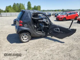 2009 Smart fortwo Pure z VIN WMEEJ31X09K267836, wystawiony jako Copart lot #55500135 z przebiegiem Nie podano mil oraz Szkody całkowita. Historia ofert i sprzedaży dostępna na DreamBid. Obrazek 3.