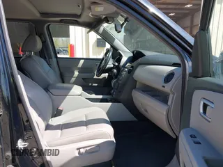 2014 Honda Pilot EX-L with VIN 5FNYF3H78EB003547, listed as a IAAI auction lot 41857061 with 192,371 mi miles and . Bid and sale history available at carsss.com. Image 5.