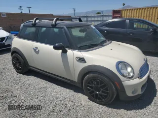 2013 MINI Hardtop with VIN WMWSU3C51DT682510, listed as a Copart auction lot 63879335 with 227,748 mi miles and Clean title. Bid and sale history available at DreamBid. Image 4.