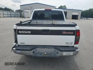 2000 Nissan Frontier XE with VIN 1N6ED27Y6YC334154, listed as a Copart auction lot 54140454 with 330,552 mi miles and Salvage title. Bid and sale history available at DreamBid. Image 6.