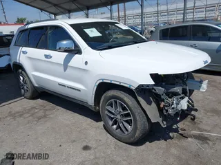 2018 Jeep Grand Cherokee Limited with VIN 1C4RJFBG3JC476986, listed as a IAAI auction lot 42076827 with 99,373 mi miles. Bid and sale history available at carsss.com. Image 1.