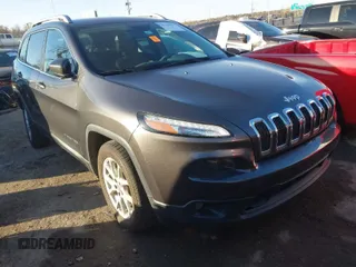 2016 Jeep Cherokee Altitude with VIN 1C4PJLCS8GW173279, listed as a IAAI auction lot 41129117 with 163,978 mi miles. Bid and sale history available at carsss.com. Image 1.