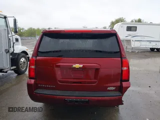 2020 Chevrolet Suburban LT with VIN 1GNSKHKC9LR233603, listed as a IAAI auction lot 41311582 with 104,754 mi miles. Bid and sale history available at carsss.com. Image 16.