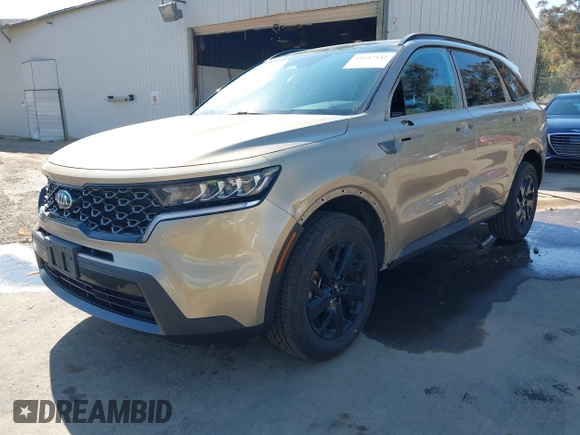 2021 Kia Sorento S with VIN 5XYRLDLC6MG008163, listed as a IAAI auction lot 41647141 with 59,669 mi miles and . Bid and sale history available at DreamBid. Image 2.