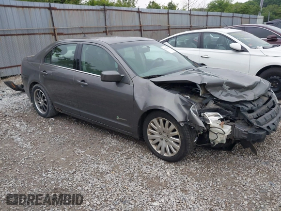 2011 Ford Fusion Hybrid with VIN 3FADP0L39BR345250, listed as a IAAI auction lot 42319401 with 321,317 mi miles and . Bid and sale history available at DreamBid. Image 1.