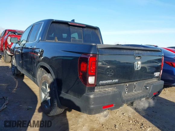 2022 Honda Ridgeline RTL-E with VIN 5FPYK3F77NB034066, listed as a IAAI auction lot 41785064 with 22,098 mi miles and . Bid and sale history available at DreamBid. Image 3.