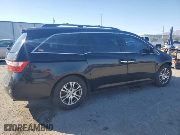 2012 Honda Odyssey EX-L with VIN 5FNRL5H64CB052869, listed as a Copart auction lot 47685375 with 168,449 mi miles and Salvage Title. Bid and sale history available at DreamBid. Image 3.