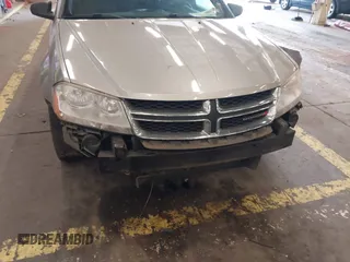 2014 Dodge Avenger SE with VIN 1C3CDZAB4EN161536, listed as a IAAI auction lot 41604009 with 107,957 mi miles. Bid and sale history available at carsss.com. Image 6.