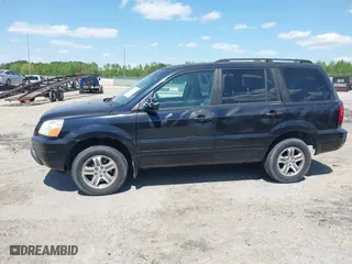 2004 Honda Pilot EX with VIN 2HKYF18524H546430, listed as a IAAI auction lot 42060241 with 126,931 mi miles. Bid and sale history available at carsss.com. Image 14.