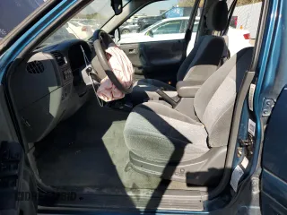 2001 Isuzu Rodeo S with VIN 4S2DM58W914301991, listed as a Copart auction lot 76518844 with 165,789 mi miles and Salvage Title. Bid and sale history available at DreamBid. Image 7.