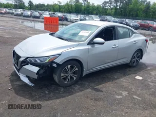 2021 Nissan Sentra SV z VIN 3N1AB8CV5MY299245, wystawiony jako IAAI lot #42180004 z przebiegiem 25 856 mil mil oraz . Historia ofert i sprzedaży dostępna na DreamBid. Obrazek 2.