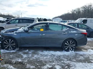 2019 Nissan Altima 2.5 Platinum with VIN 1N4BL4FWXKC158811, listed as a IAAI auction lot 41258530 with 64,779 mi miles. Bid and sale history available at carsss.com. Image 14.