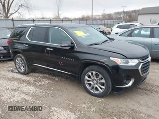 2018 Chevrolet Traverse Premier z VIN 1GNERKKW5JJ230449, wystawiony jako IAAI lot #41523840 z przebiegiem 99 632 mil mil oraz . Historia ofert i sprzedaży dostępna na DreamBid. Obrazek 1.