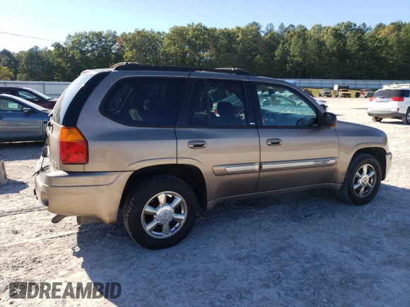 2002 GMC Envoy SLT with VIN 1GKDT13S022456264, listed as a Copart auction lot 76556004 with 230,954 mi miles and Salvage Title. Bid and sale history available at DreamBid. Image 3.
