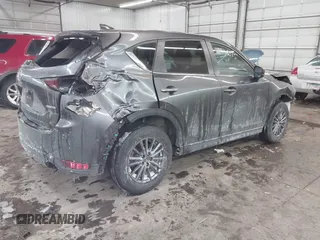 2020 Mazda CX-5 Touring with VIN JM3KFBCM0L0843242, listed as a IAAI auction lot 41536075 with 31,849 mi miles. Bid and sale history available at carsss.com. Image 4.