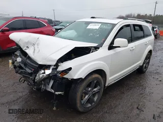 2015 Dodge Journey Crossroad with VIN 3C4PDCGG1FT548706, listed as a IAAI auction lot 41568038 with 142,435 mi miles and . Bid and sale history available at DreamBid. Image 2.