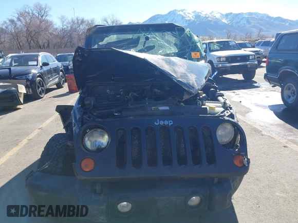2013 Jeep Wrangler Sport with VIN 1C4AJWAG0DL645039, listed as a IAAI auction lot 41847808 with Not provided miles and . Bid and sale history available at DreamBid. Image 12.