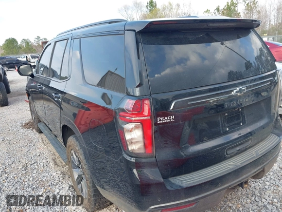 2021 Chevrolet Tahoe Z71 with VIN 1GNSKPKD8MR122190, listed as a IAAI auction lot 41587419 with 106,828 mi miles and . Bid and sale history available at DreamBid. Image 3.