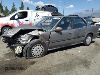 1992 Honda Accord z VIN 1HGCB7656NA066784, wystawiony jako Copart lot #51804405 z przebiegiem 127 769 mil mil oraz Szkoda całkowita • Salvage title. Historia ofert i sprzedaży dostępna na DreamBid. Obrazek 1.