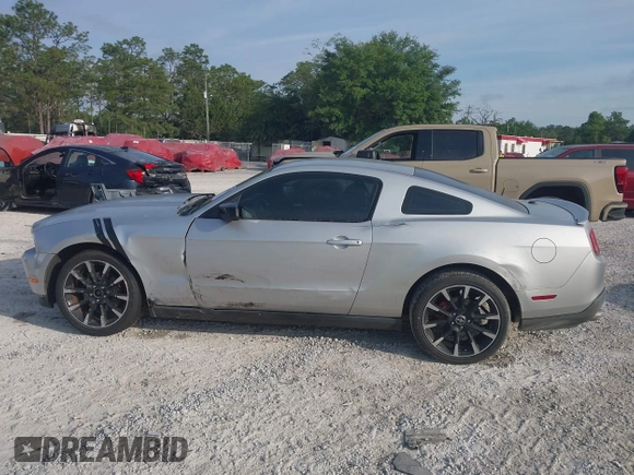 2012 Ford Mustang Premium with VIN 1ZVBP8AM7C5288124, listed as a IAAI auction lot 42280797 with 188,223 mi miles and . Bid and sale history available at DreamBid. Image 14.