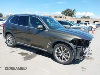 2021 BMW X5 xDrive45e with VIN 5UXTA6C02M9F01452, listed as a IAAI auction lot 41946575 with 37,868 mi miles. Bid and sale history available at carsss.com. Image 1.