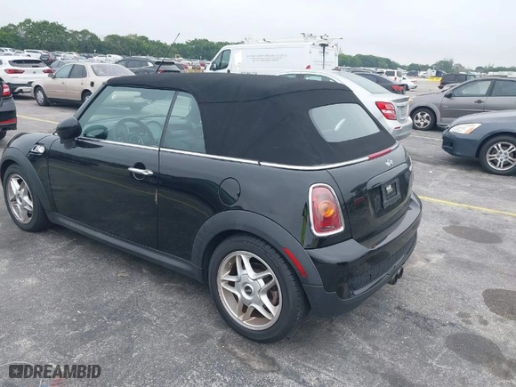 2010 MINI Cooper Convertible S with VIN WMWMS3C52ATY08772, listed as a IAAI auction lot 41845412 with 71,215 mi miles. Bid and sale history available at carsss.com. Image 3.