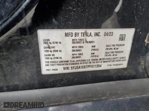 2023 Tesla Model S Plaid with VIN 5YJSA1E67PF511354, listed as a Copart auction lot 56648975 with 69,002 mi miles and Salvage title. Bid and sale history available at DreamBid. Image 13.