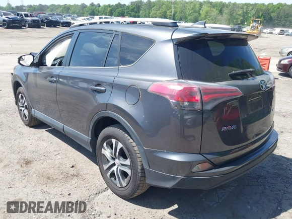 2016 Toyota RAV4 LE with VIN JTMZFREV7GJ086149, listed as a IAAI auction lot 42064251 with 90,104 mi miles and . Bid and sale history available at DreamBid. Image 3.
