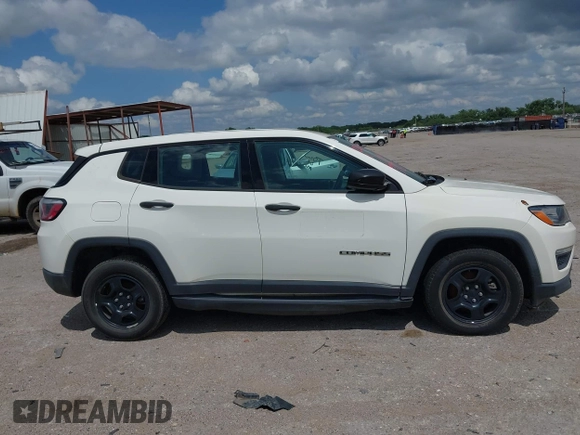 2018 Jeep Compass Sport with VIN 3C4NJCAB3JT263298, listed as a IAAI auction lot 42218194 with 104,604 mi miles and . Bid and sale history available at DreamBid. Image 12.