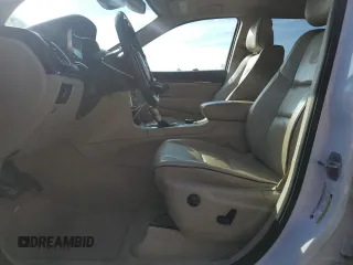2019 Jeep Grand Cherokee Overland with VIN 1C4RJFCT2KC834690, listed as a Copart auction lot 84303144 with 63,053 mi miles and Salvage Title. Bid and sale history available at carsss.com. Image 7.