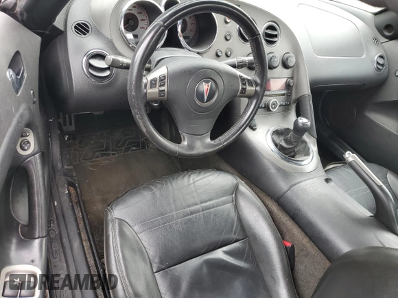 2008 Pontiac Solstice z VIN 1G2MB35B28Y108306, wystawiony jako Copart lot #51535025 z przebiegiem 79 099 mil mil oraz Szkoda całkowita • Salvage title. Historia ofert i sprzedaży dostępna na DreamBid. Obrazek 8.