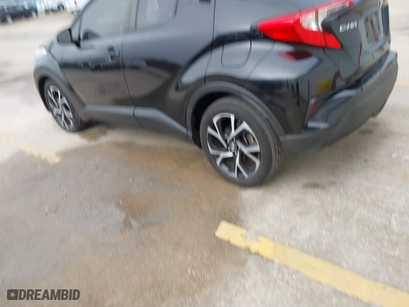 2019 Toyota C-HR XLE with VIN NMTKHMBX2KR094898, listed as a IAAI auction lot 41940883 with 94,351 mi miles. Bid and sale history available at carsss.com. Image 14.