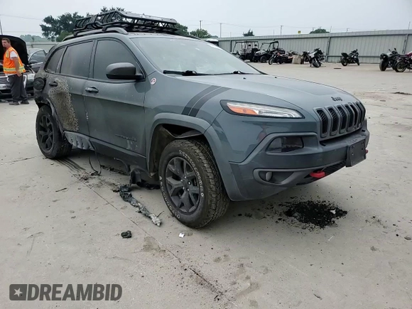 2015 Jeep Cherokee Trailhawk with VIN 1C4PJMBS9FW576340, listed as a Copart auction lot 57108045 with Not provided miles and Non repairable. Bid and sale history available at DreamBid. Image 14.