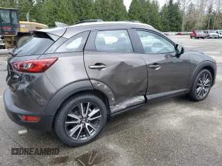2017 Mazda CX-3 Touring with VIN JM1DKFC79H0148103, listed as a Copart auction lot 51343025 with 79,765 mi miles and Salvage Title. Bid and sale history available at DreamBid. Image 3.