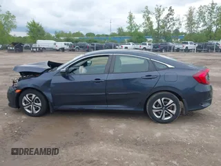 2017 Honda Civic LX z VIN 2HGFC2F54HH567210, wystawiony jako IAAI lot #42254401 z przebiegiem 30 126 mil mil oraz . Historia ofert i sprzedaży dostępna na DreamBid. Obrazek 14.