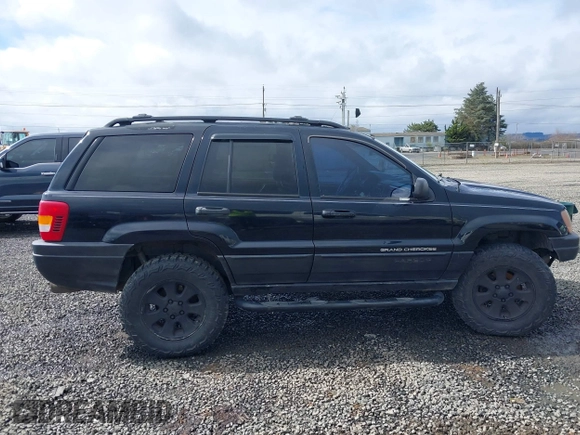2001 Jeep Grand Cherokee Laredo with VIN 1J4GW48N61C642351, listed as a IAAI auction lot 41783127 with 194,578 mi miles and . Bid and sale history available at DreamBid. Image 13.