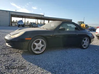 1999 Porsche 911 with VIN WP0CA2998XS652905, listed as a Copart auction lot 87506015 with 94,631 mi miles and Salvage Title. Bid and sale history available at DreamBid. Image 1.