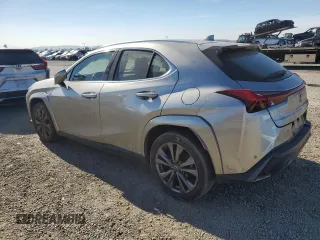 2022 Lexus UX 250h F Sport with VIN JTHE9JBHXN2057367, listed as a Copart auction lot 85917724 with 60,556 mi miles and Salvage Title. Bid and sale history available at DreamBid. Image 2.