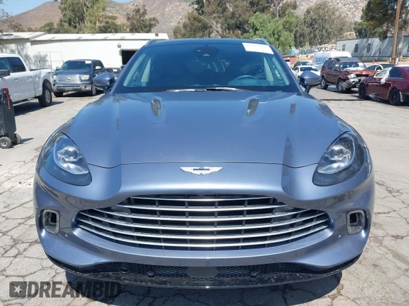2021 Aston Martin DBX z VIN SCFVUJAW8MTV02568, wystawiony jako IAAI lot #42183964 z przebiegiem 53 608 mil mil oraz . Historia ofert i sprzedaży dostępna na DreamBid. Obrazek 12.