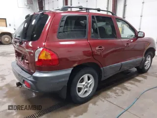 2003 Hyundai Santa Fe GLS with VIN KM8SC73D63U368408, listed as a IAAI auction lot 41514597 with 137,895 mi miles. Bid and sale history available at carsss.com. Image 4.