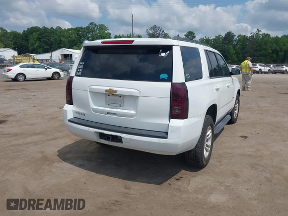 2017 Chevrolet Tahoe LT with VIN 1GNSCBKC4HR170217, listed as a IAAI auction lot 42446054 with 89,483 mi miles and . Bid and sale history available at DreamBid. Image 4.